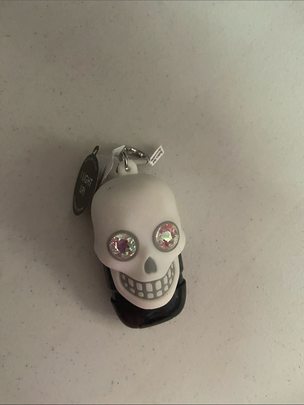 Light up skull hand sanitizer with holder